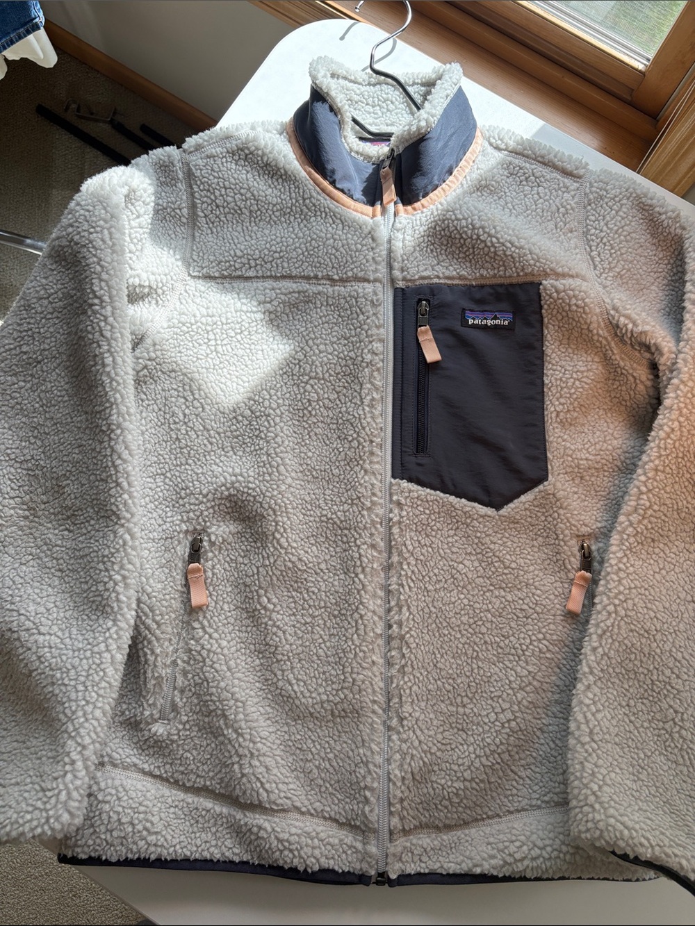 Patagonia Cream Sherpa Jacket with Black Chest Pocket and Tan Trim